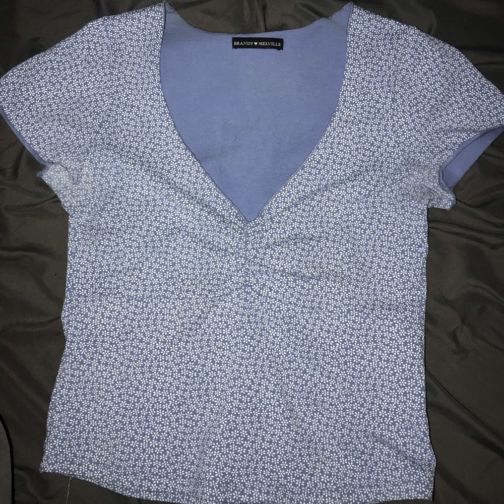 Brandy Melville blue top with white floral print